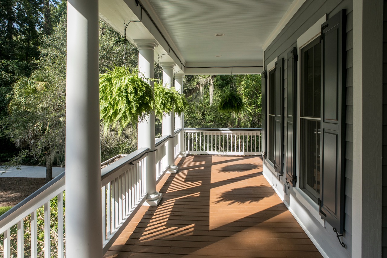 Wrap around porch on beautiful luxury home.